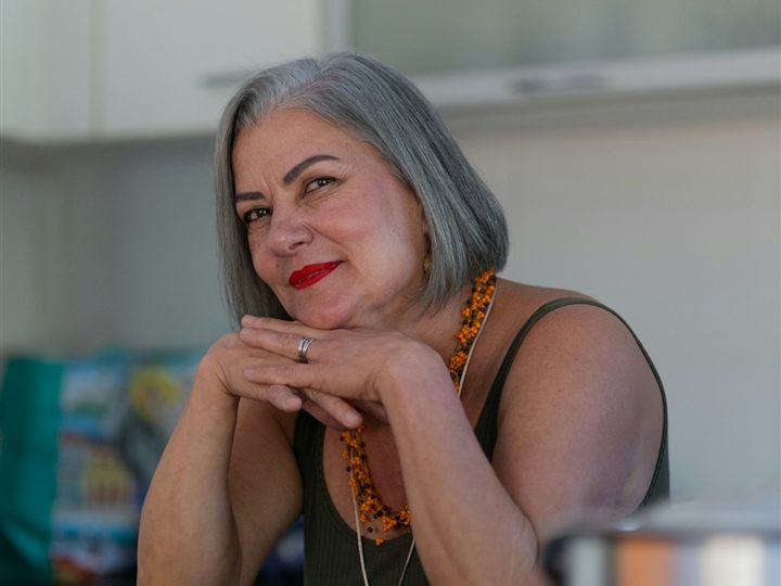 A woman in her 50s in her kitchen — the daily ritual Java Burn is designed to fit into